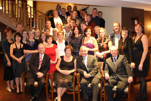 Picture shows staff members at retirement function for former Principal, Mr Denis Ring